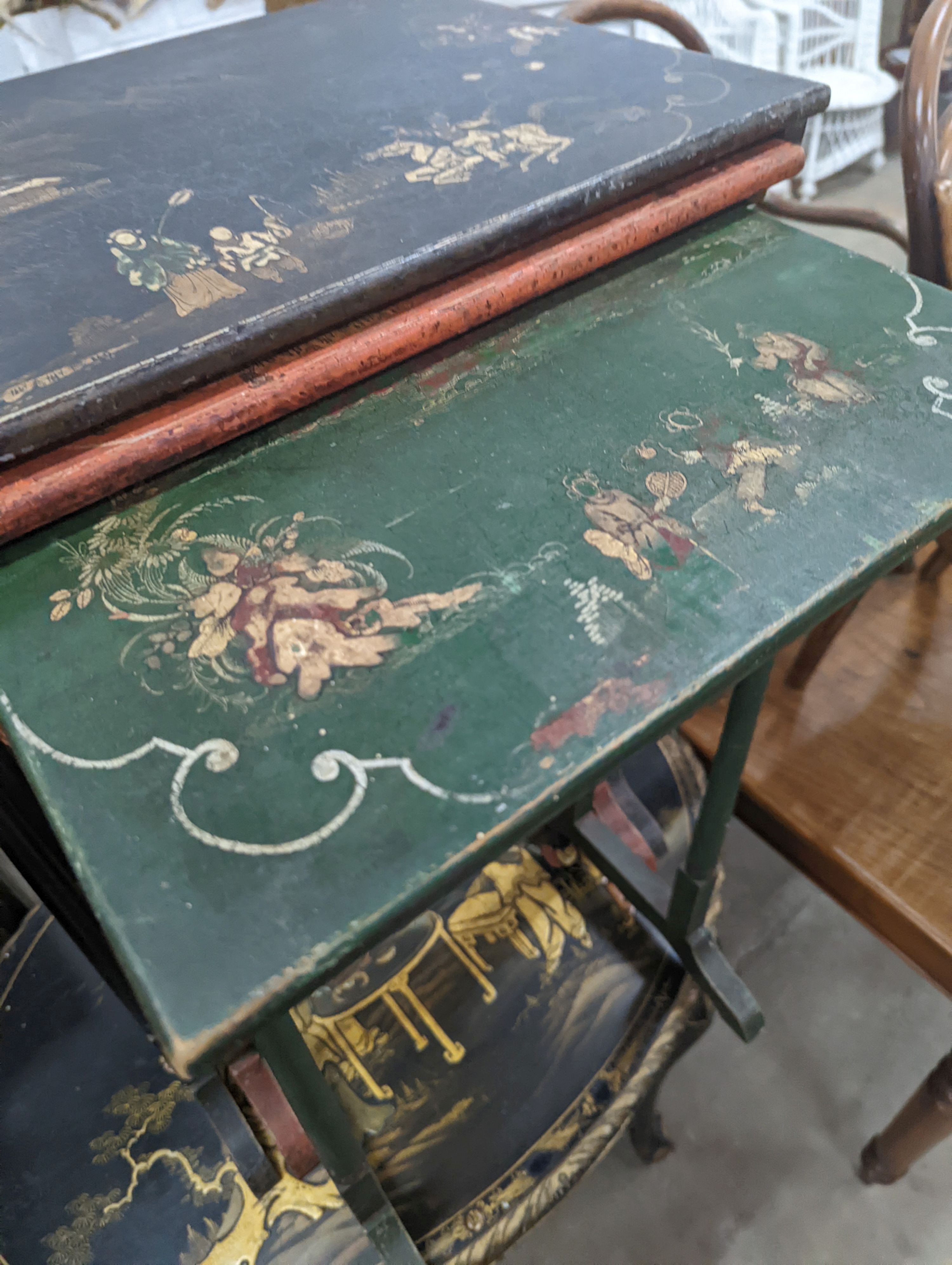 A nest of painted and lacquered rectangular tea tables, width 50cm, depth 36cm, height 71cm